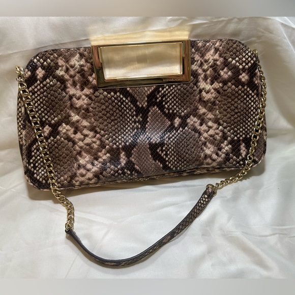 Michael Kors Handbags - Michael Kors Blush Snakeskin Clutch